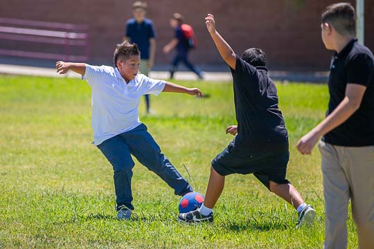 Students play soccer despite our Tucson heat.
