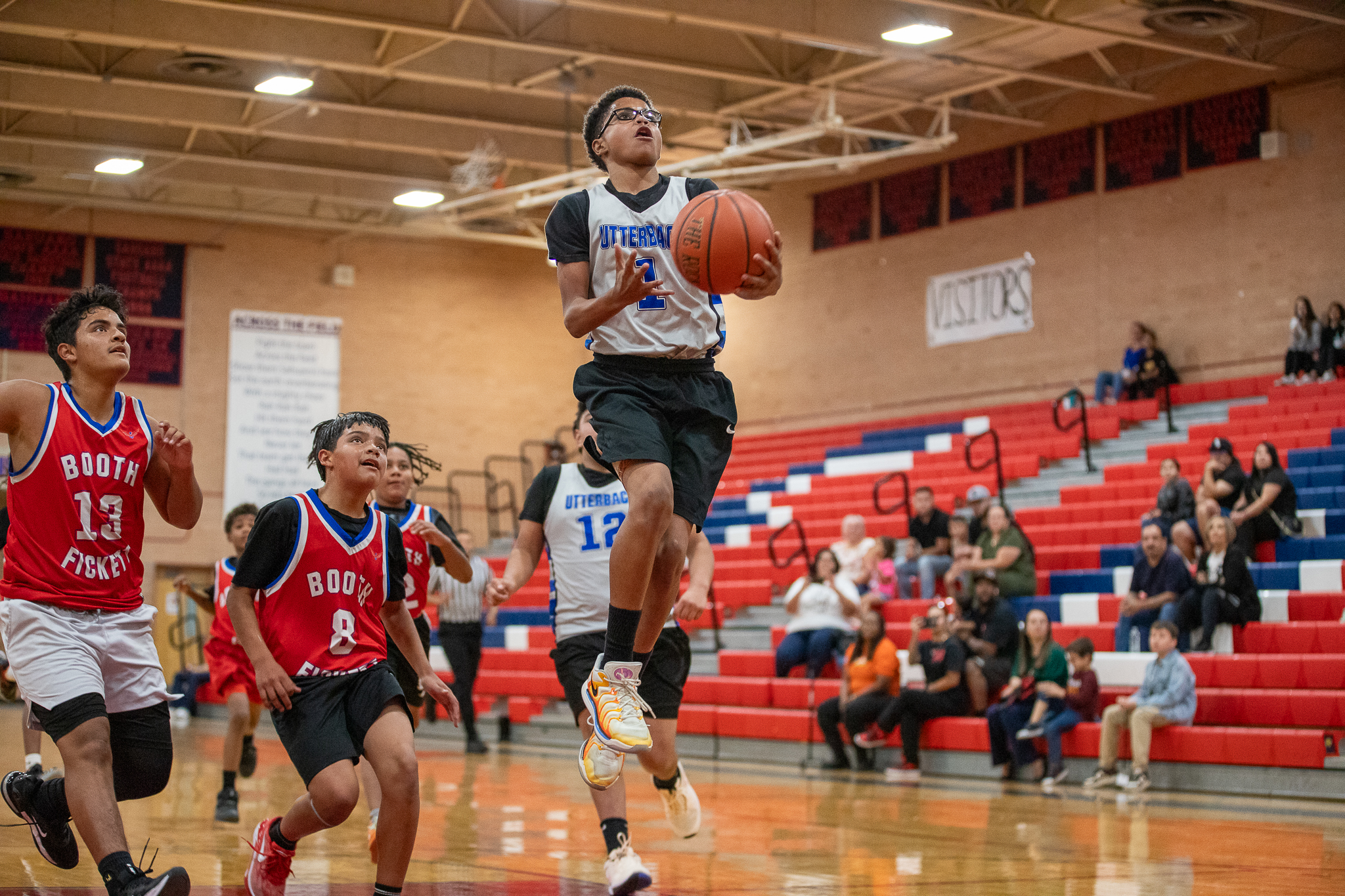 An Utterback player goes in for a layup