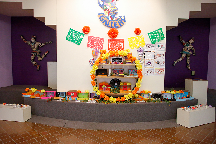 A colorfully decorated ofrenda