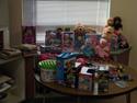 A photo of all the toys collected for the toy drive on a table.